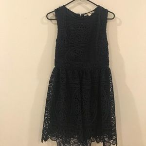 One dark blue dress from Mi a Mi brand